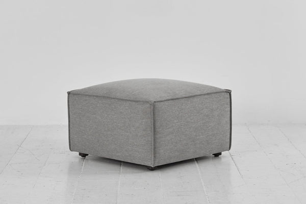 Shadow image 2 - Model 03 Ottoman in Shadow Linen Side Angle View